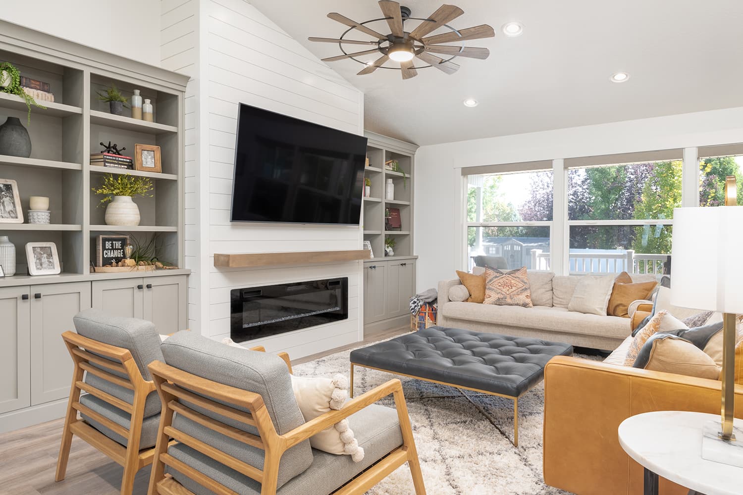 Contemporary basement remodel with open layout and custom lighting in Davis County