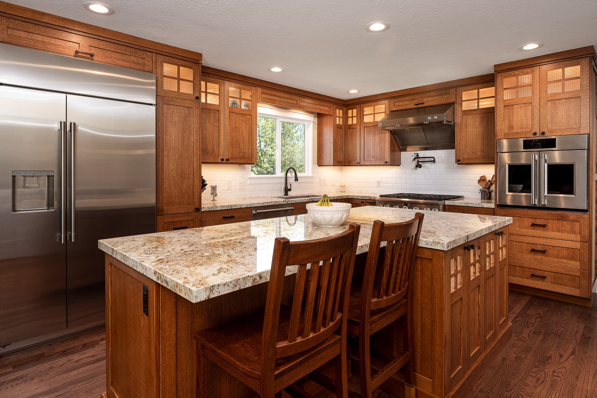 Wooden styled modern basement kitchen with custom cabinetry in Weber County